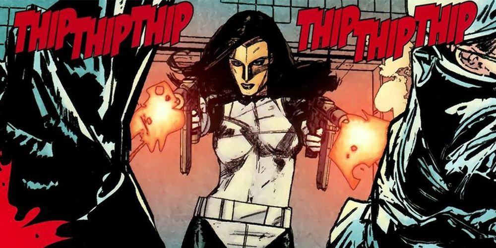 Madame Masque opening fire.