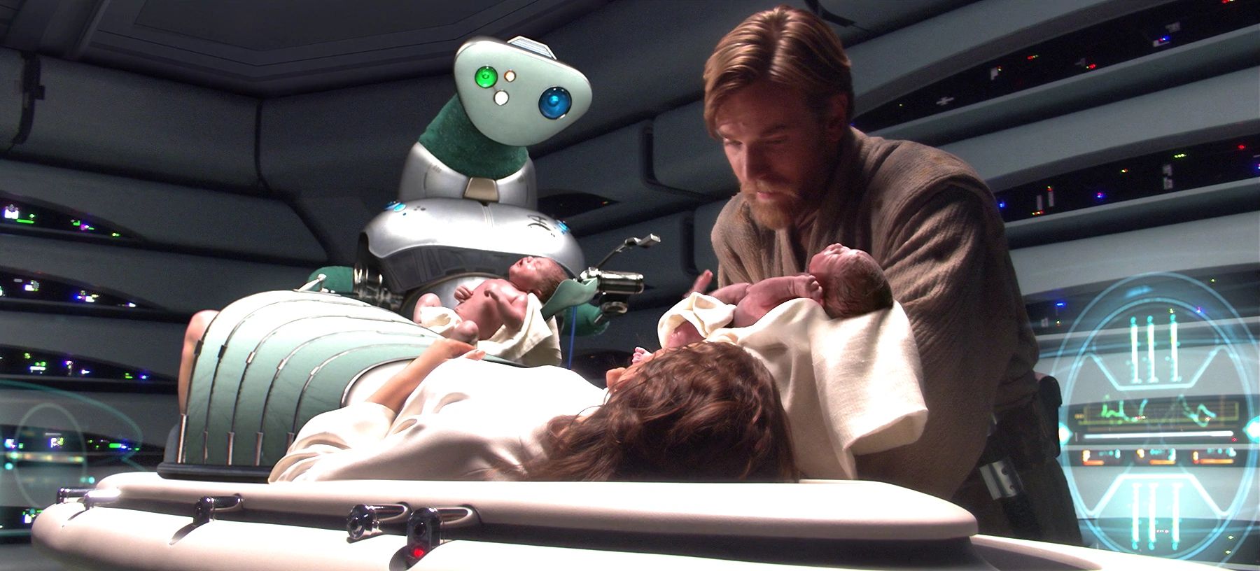 Padme Amidala in childbirth with Obi-Wan Kenobi beside her