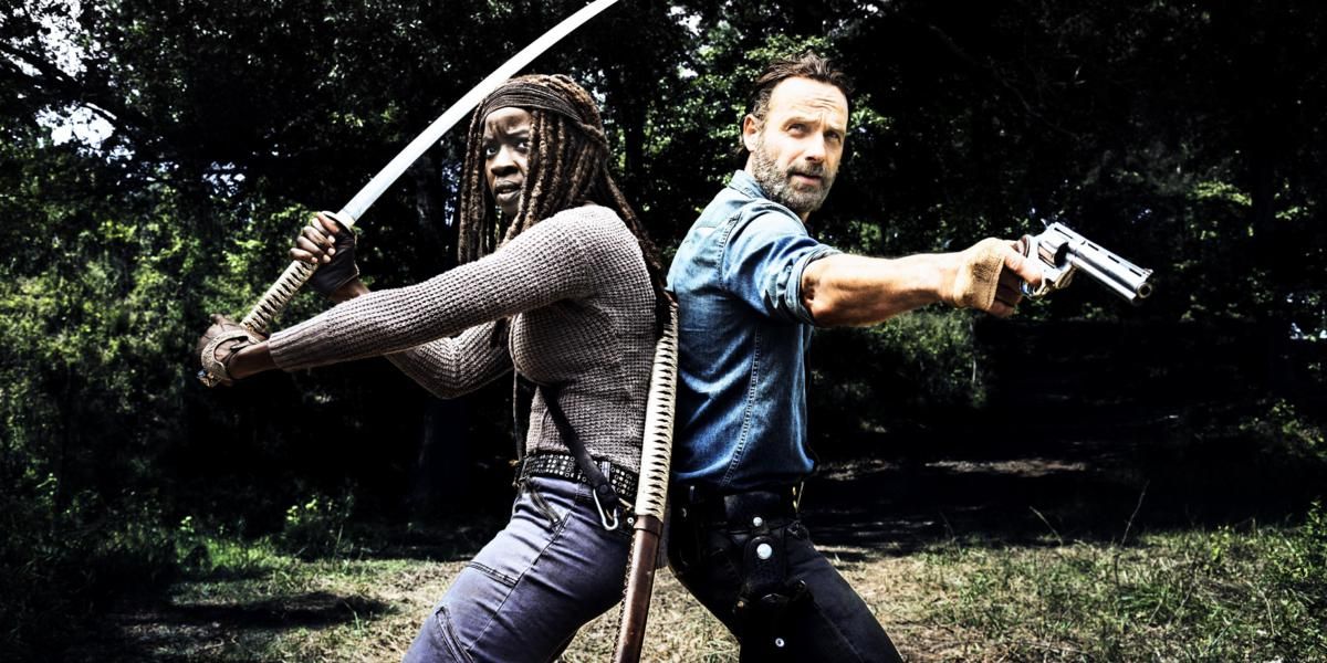 Rick Grimes (Andrew Lincoln) and Michonne (Danai Gurira) stand back-to-back in The Walking Dead