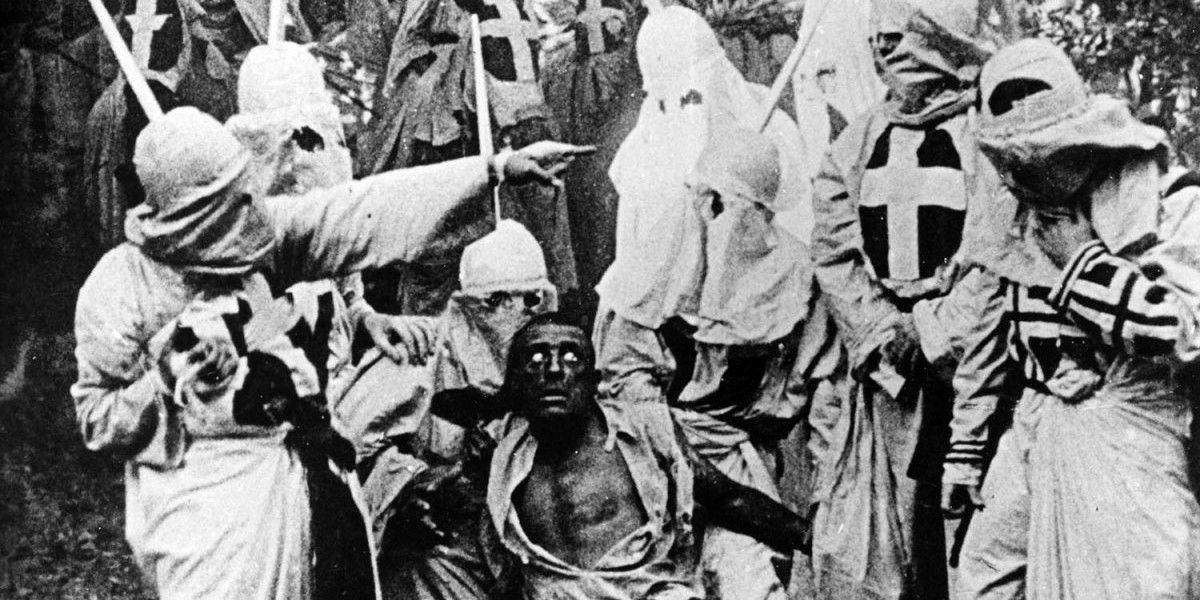 The Klan lynches their victim in The Birth of a Nation