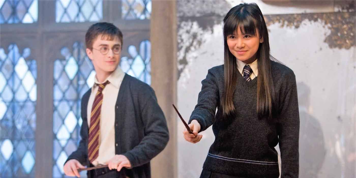 Cho Chang holding her wand while Harry looks at her in Harry Potter.