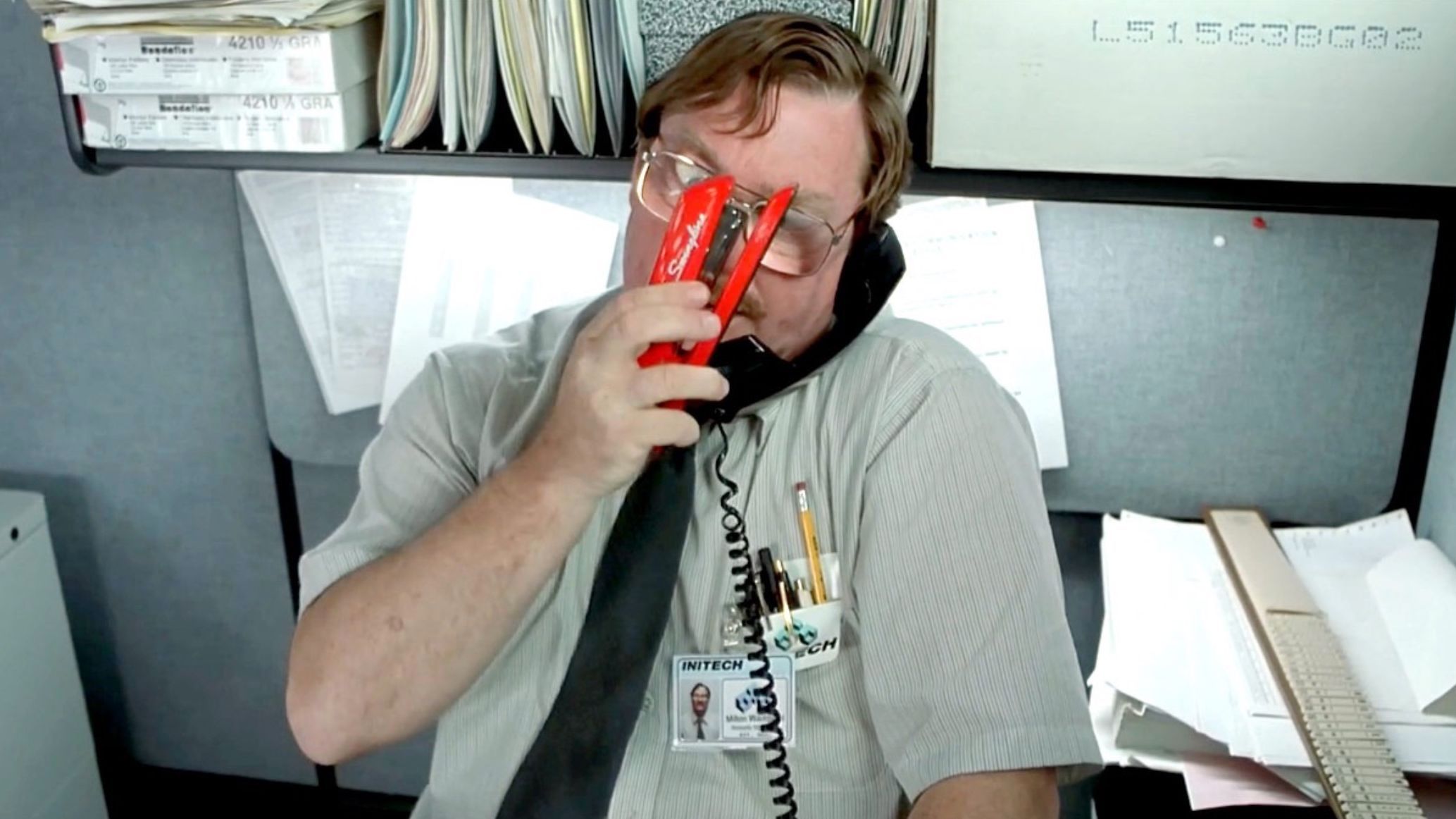 The Strange Story Of The Infamous Red Stapler In Office Space   Office Space Milton Red Stapler 3 