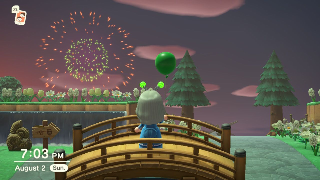 A player watches the fireworks in Animal Crossing: New Horizons
