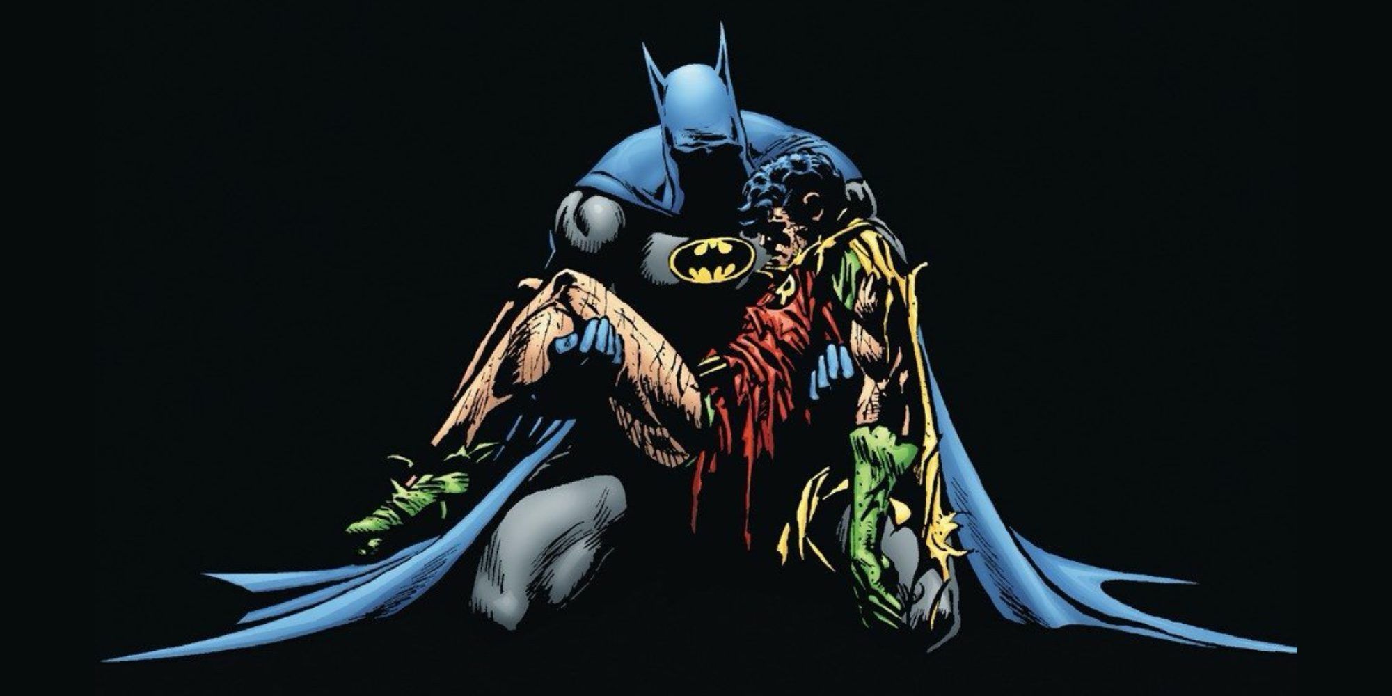 Batman holds a dying Robin in "Death in the Family."