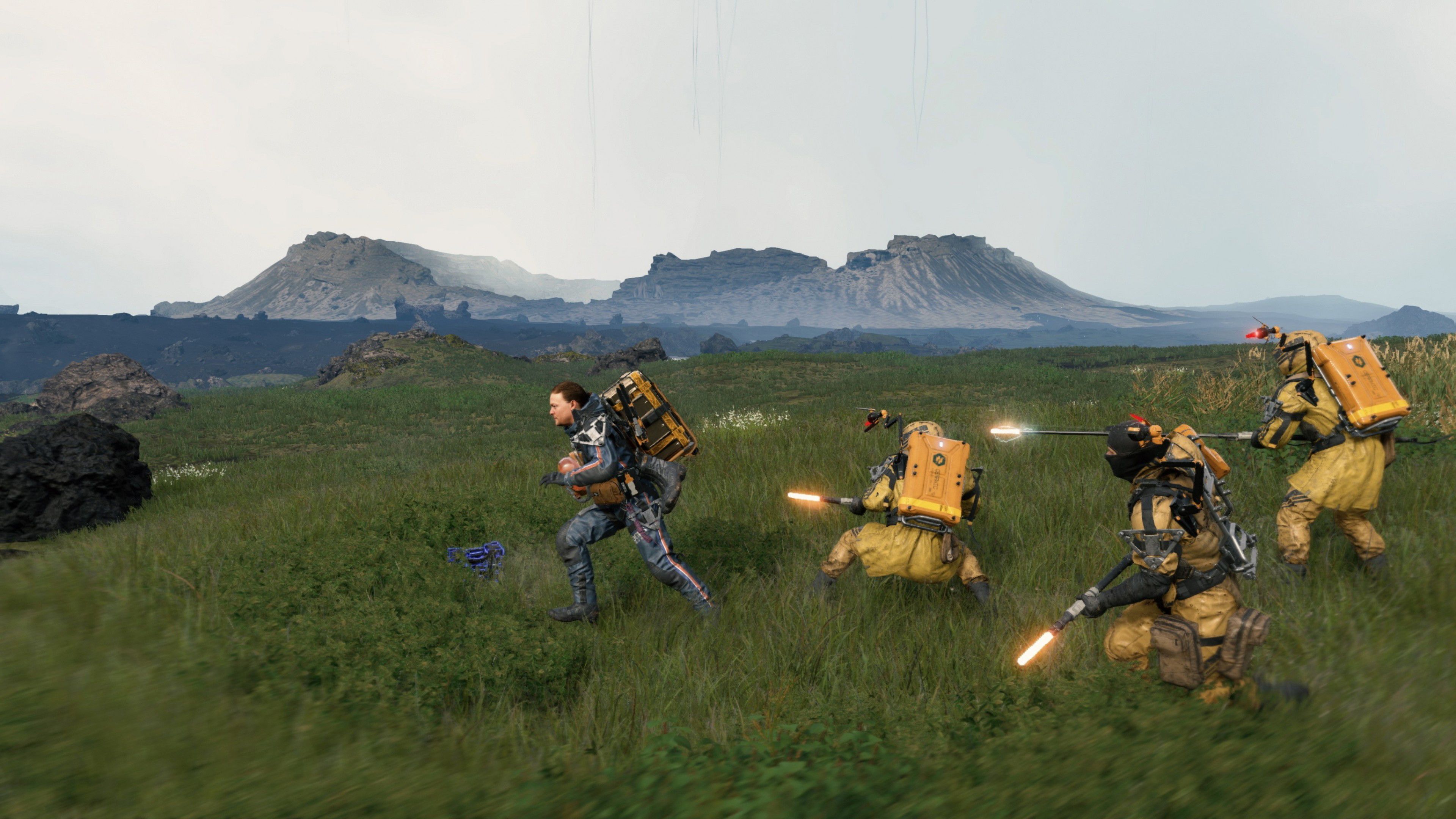 A character getting chased during a delivery in Death Stranding