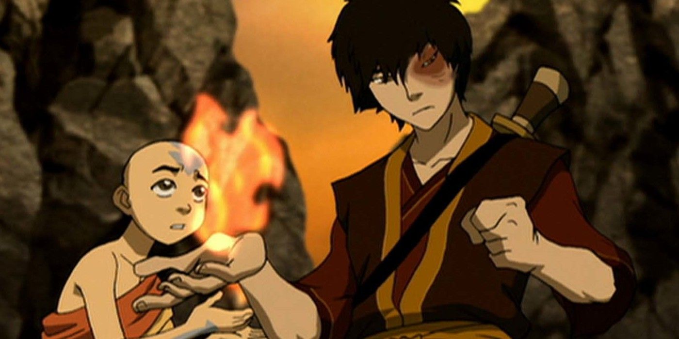 Zuko holds fire in his hand while Aang watches.