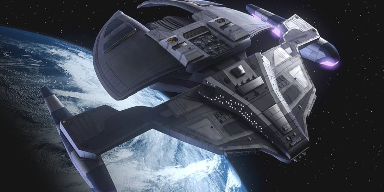 The Jem'Hadar Fighter from Star Trek hovering above the Earth's orbit