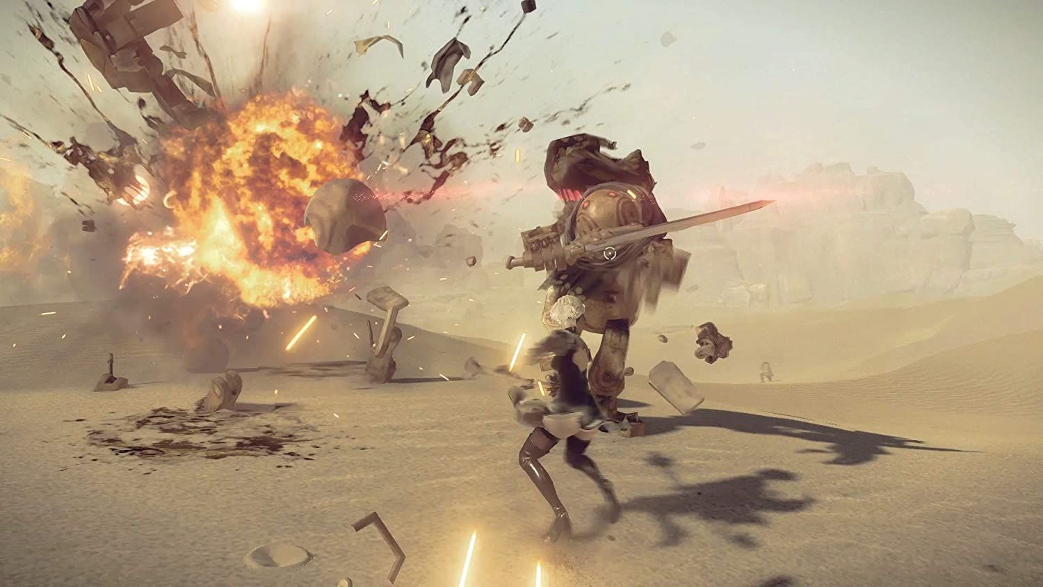 The player uses a sword with an explosion in the background in Nier Automata