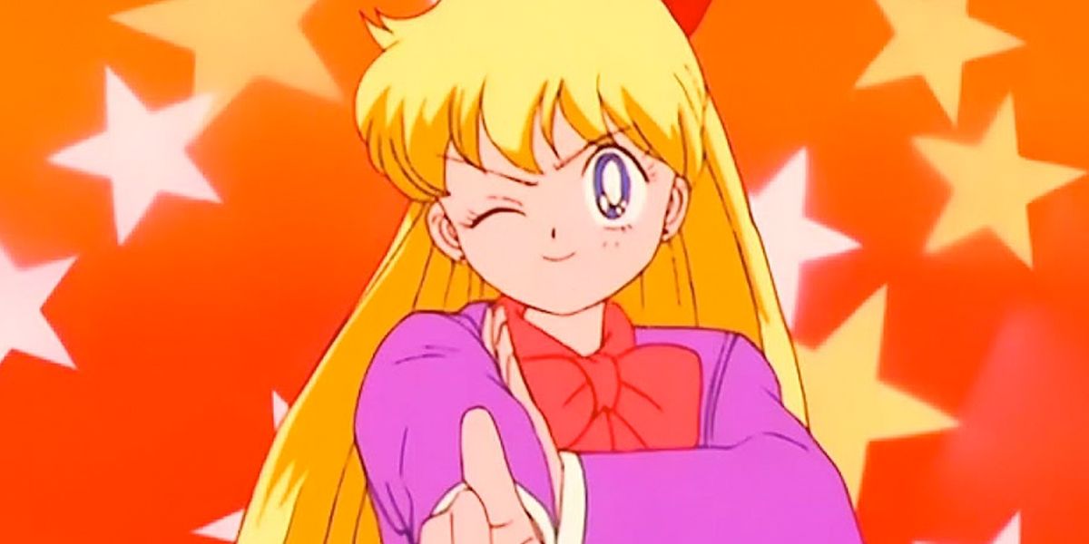 Minako from Sailor Moon winking and pointing