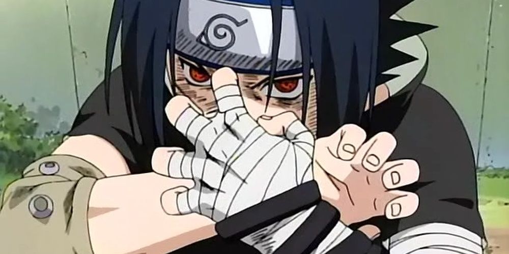 Sasuke Uchiha in a fighting stance in Naruto.