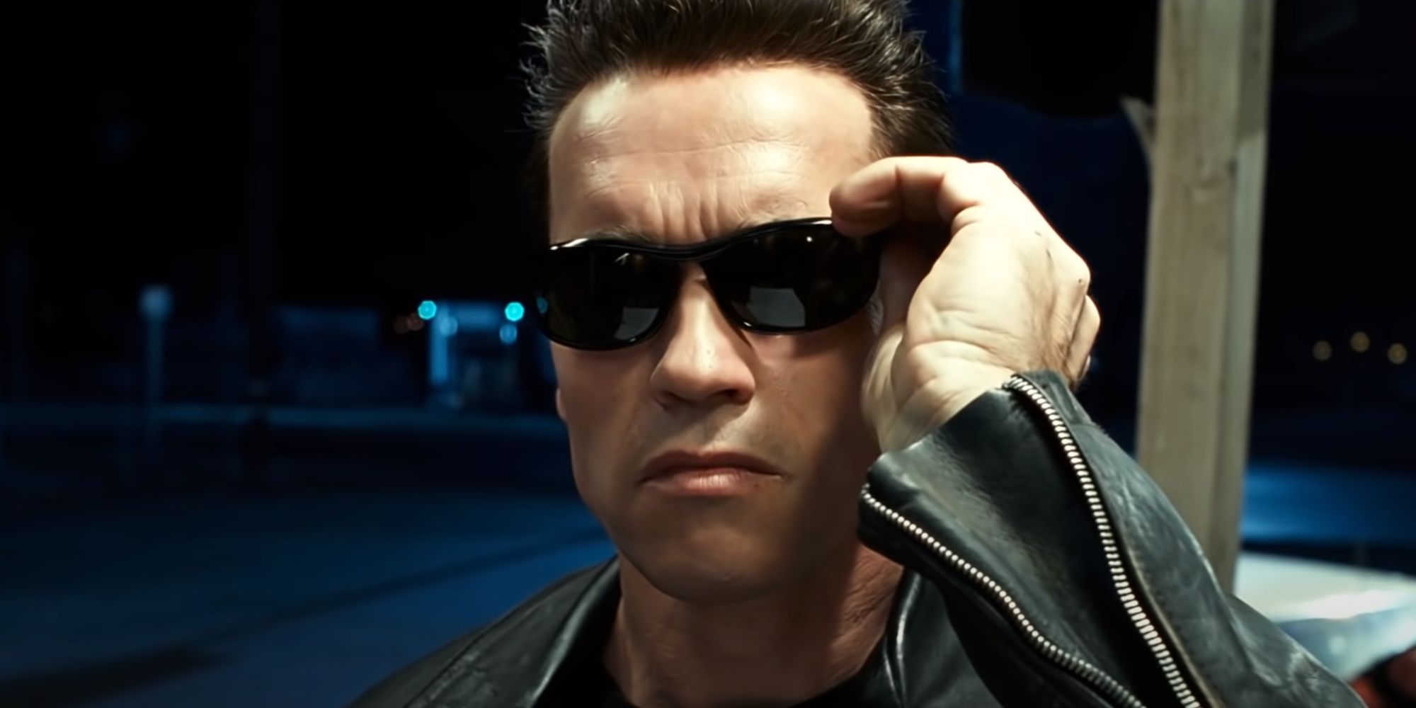 the Terminator adjusts his sunglasses