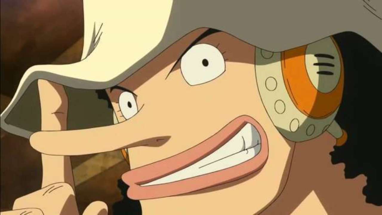 Ussop smiling while touching his hat in One Piece.