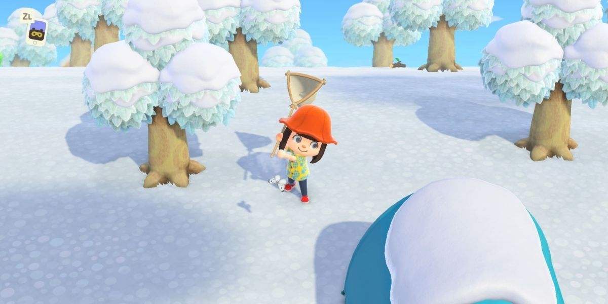 Residente pegando bug no inverno em Animal Crossing: New Horizons