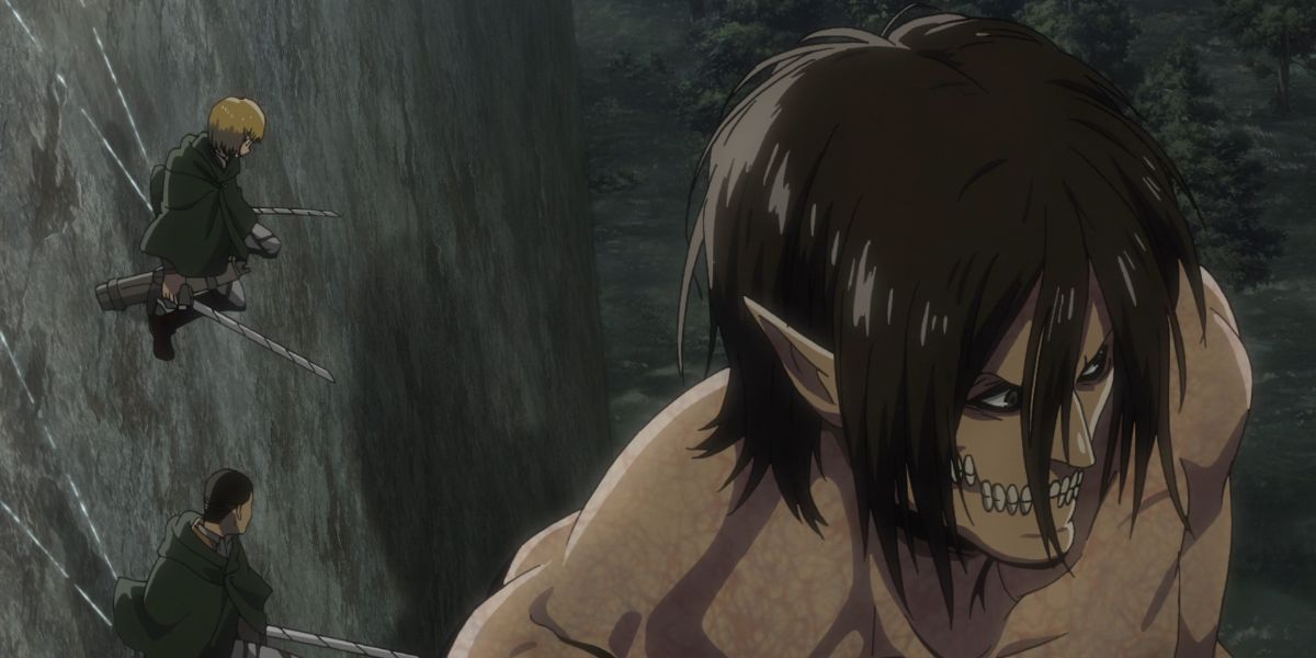 Eren in Attack Titan form stands by scouts in Attack on Titan.