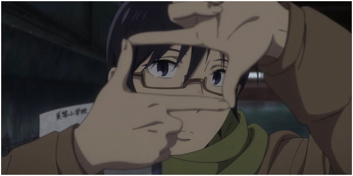 Satoru making a frame with his hands in the Erased anime.