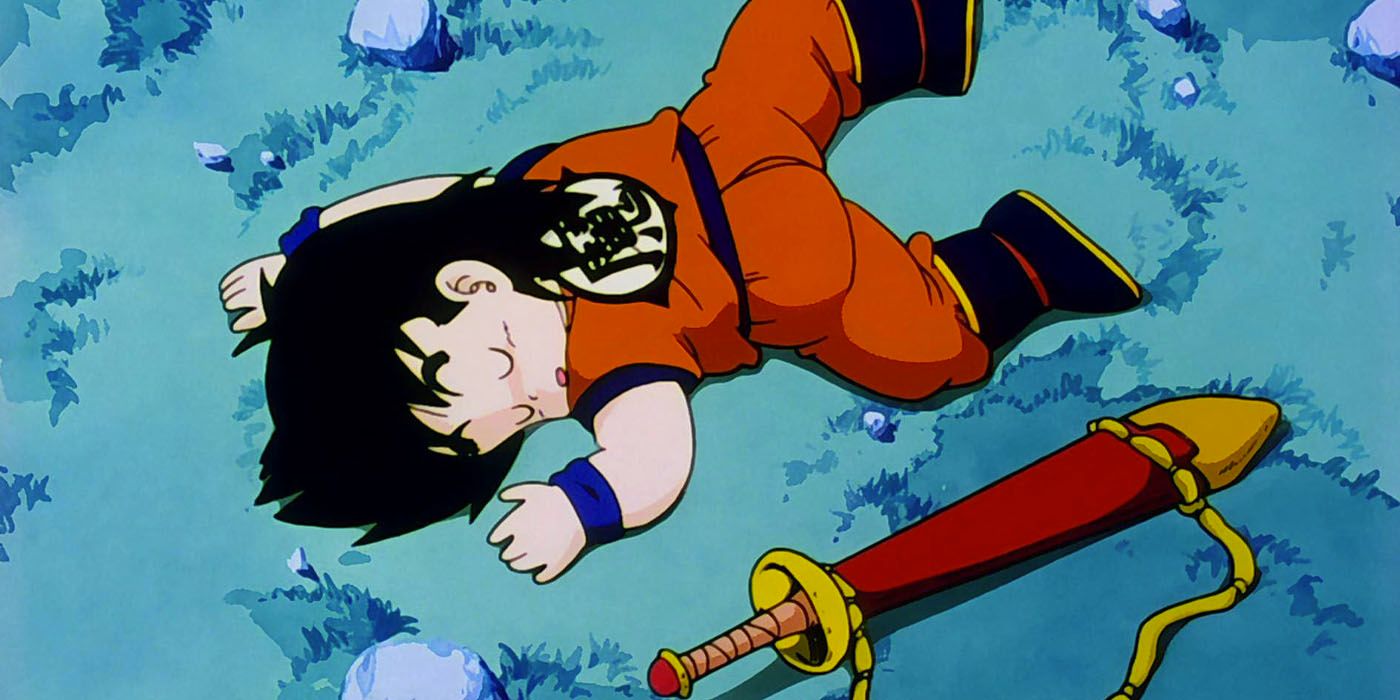 Gohan sleeps in the wilderness with his sword by his side in Dragon Ball Z