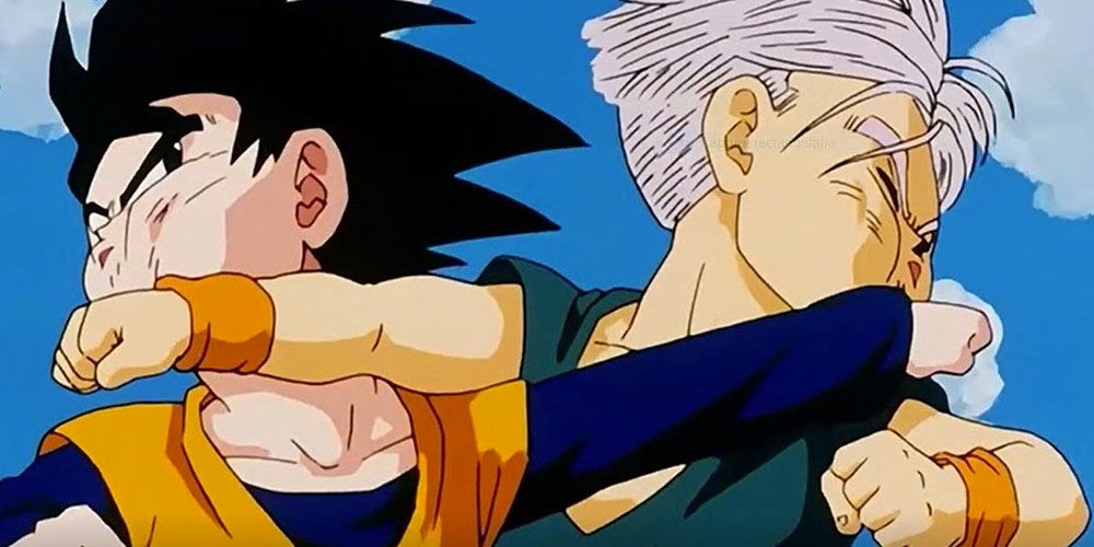 Goten and Trunks punch each other in tandem in Dragon Ball Z.