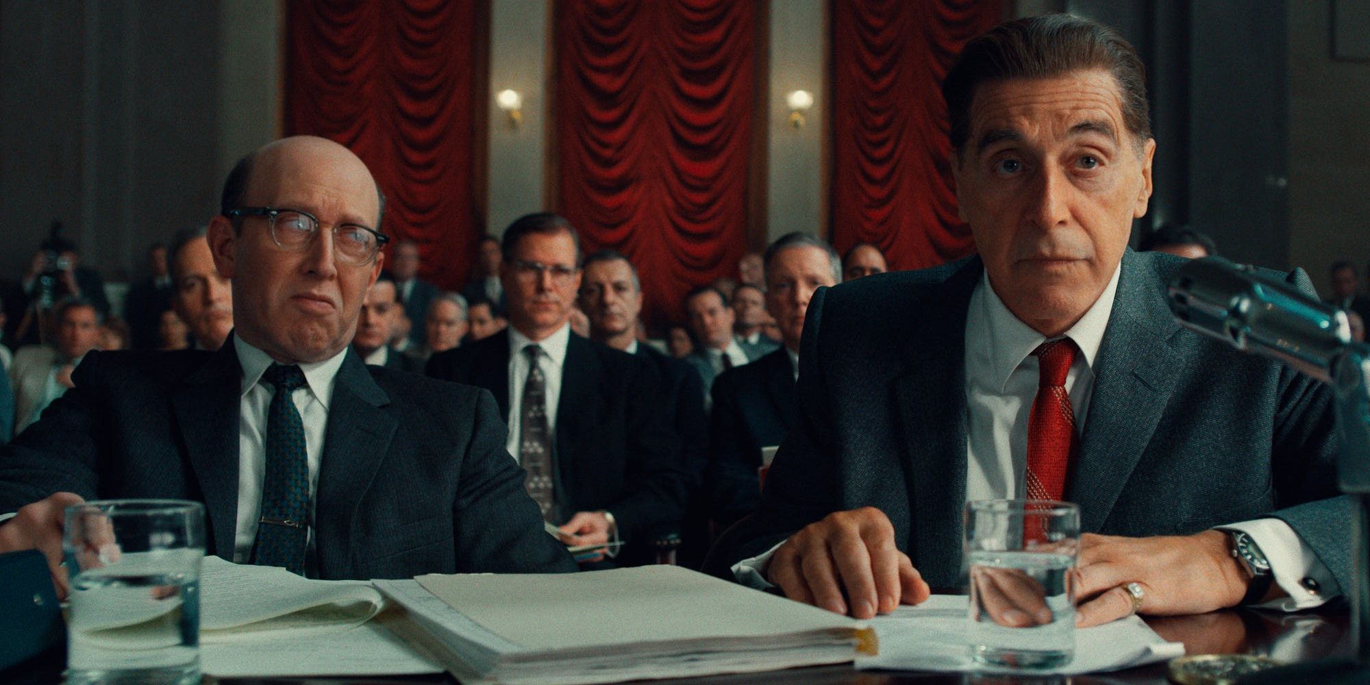 Al Pacino at a defendant's table in court during The Irishman.