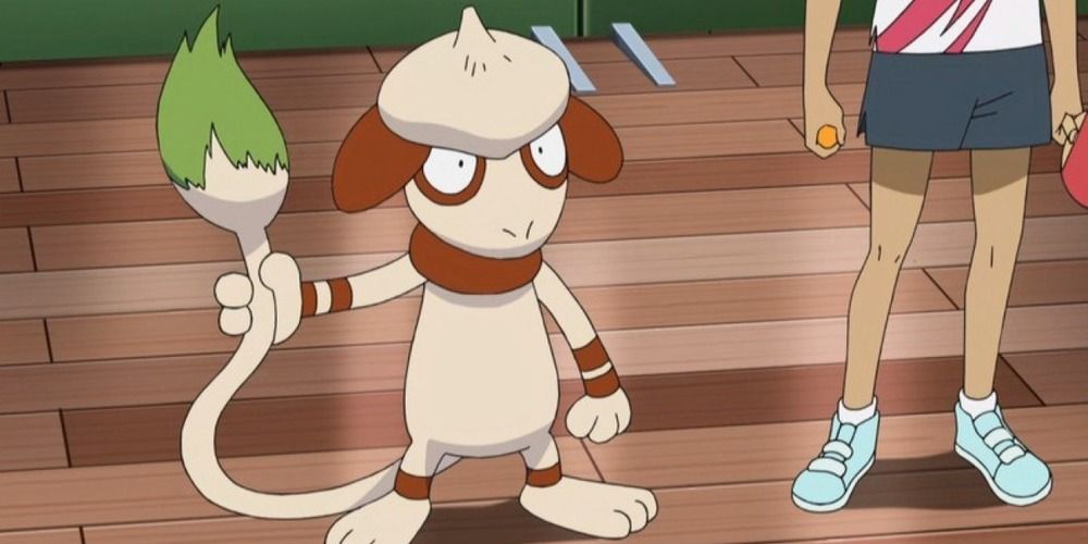 Smeargle holding its paintbrush tail in the Pokemon anime