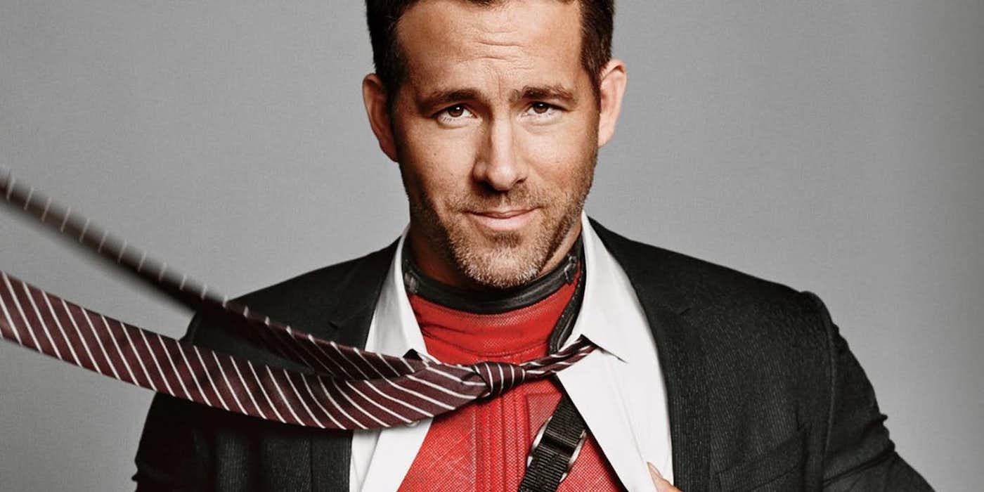 Ryan Reynolds in a formal suit with a Deadpool suit underneath