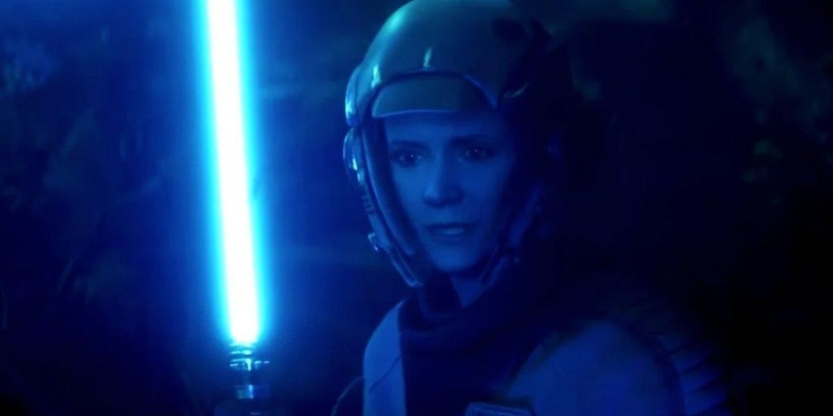 princess leia in a flashback with a blue lightsaber