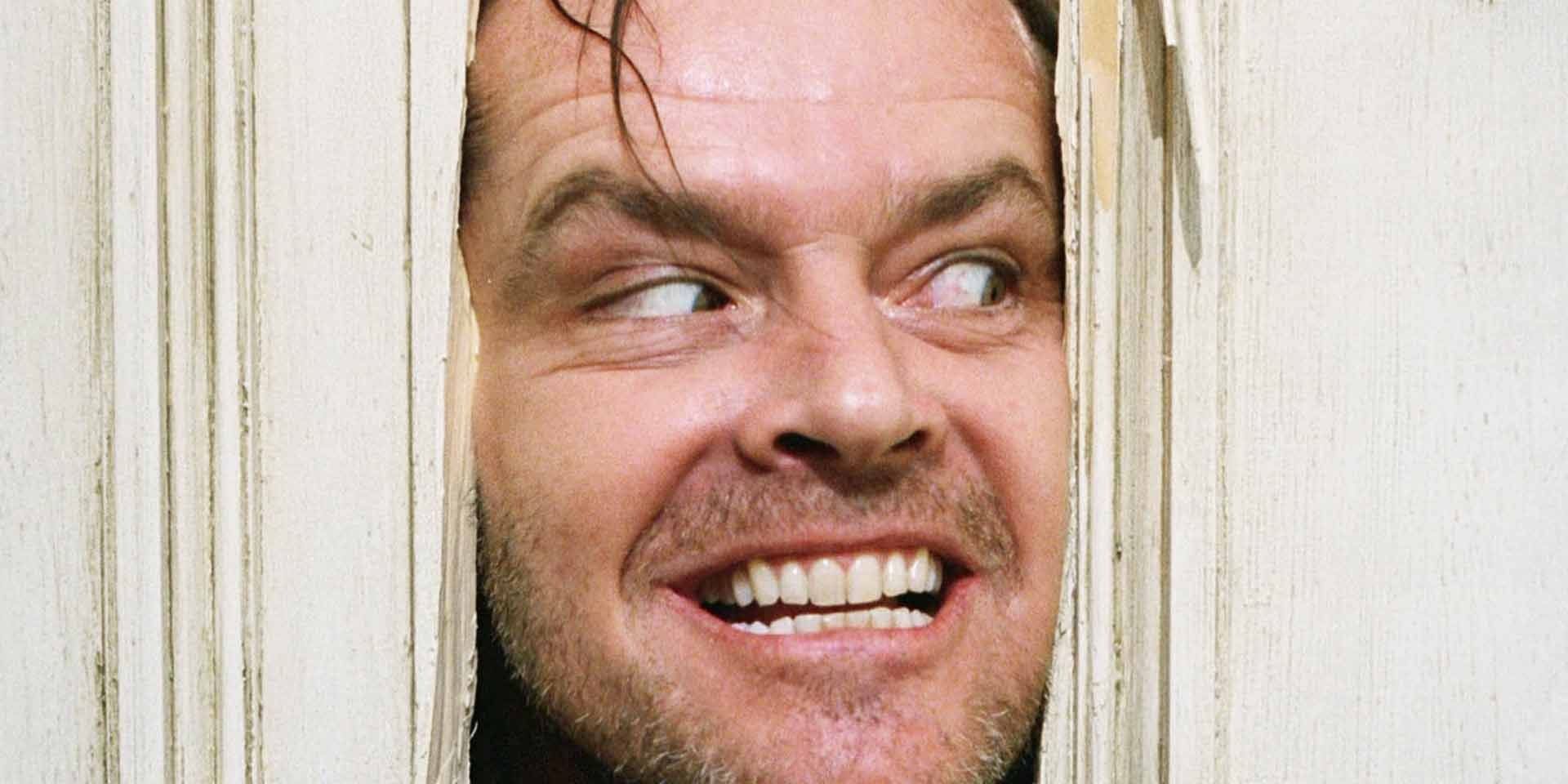 Jack Torrance breaking through a door in The Shining