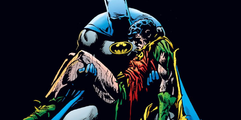 Batman holds Jason Todd after death
