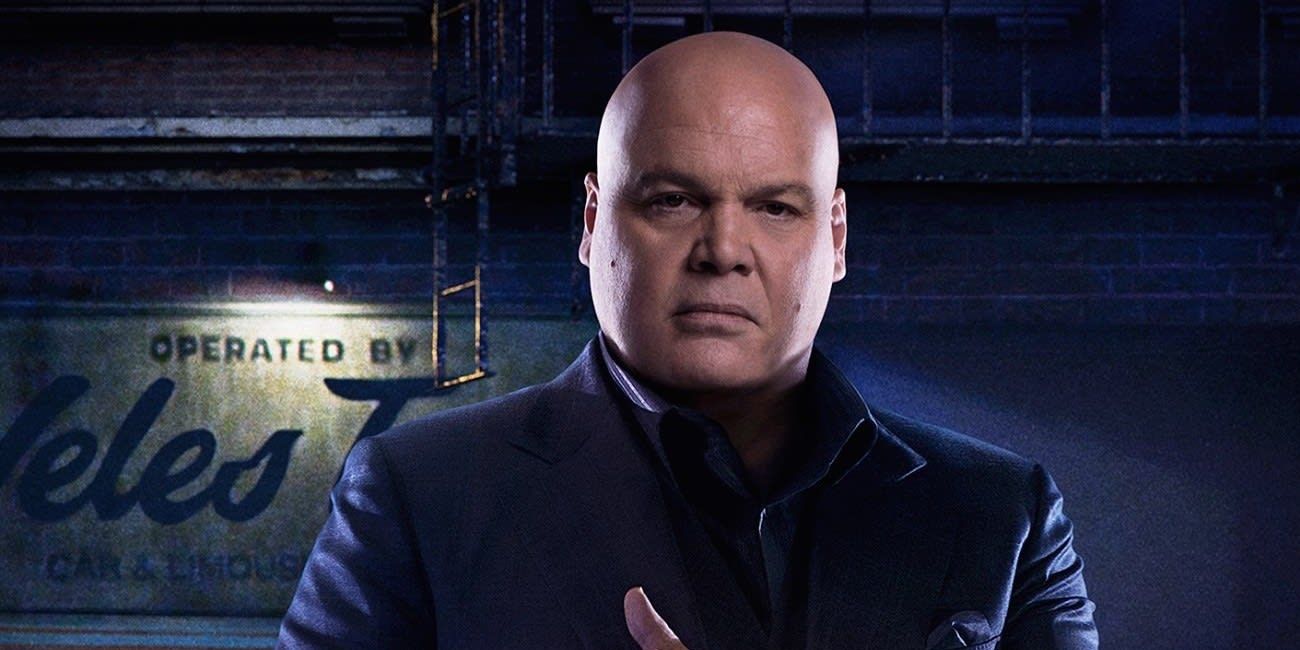 Vincent D'Onofrio posing in front of a run-down building in his role as Kingpin in the Netflix Daredevil series