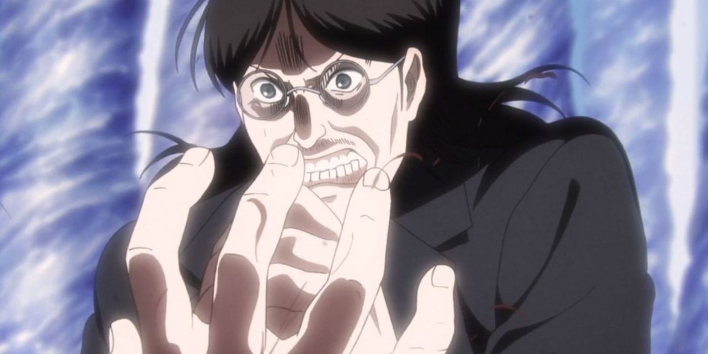eren's father looking extremely shocked at what is about to happen
