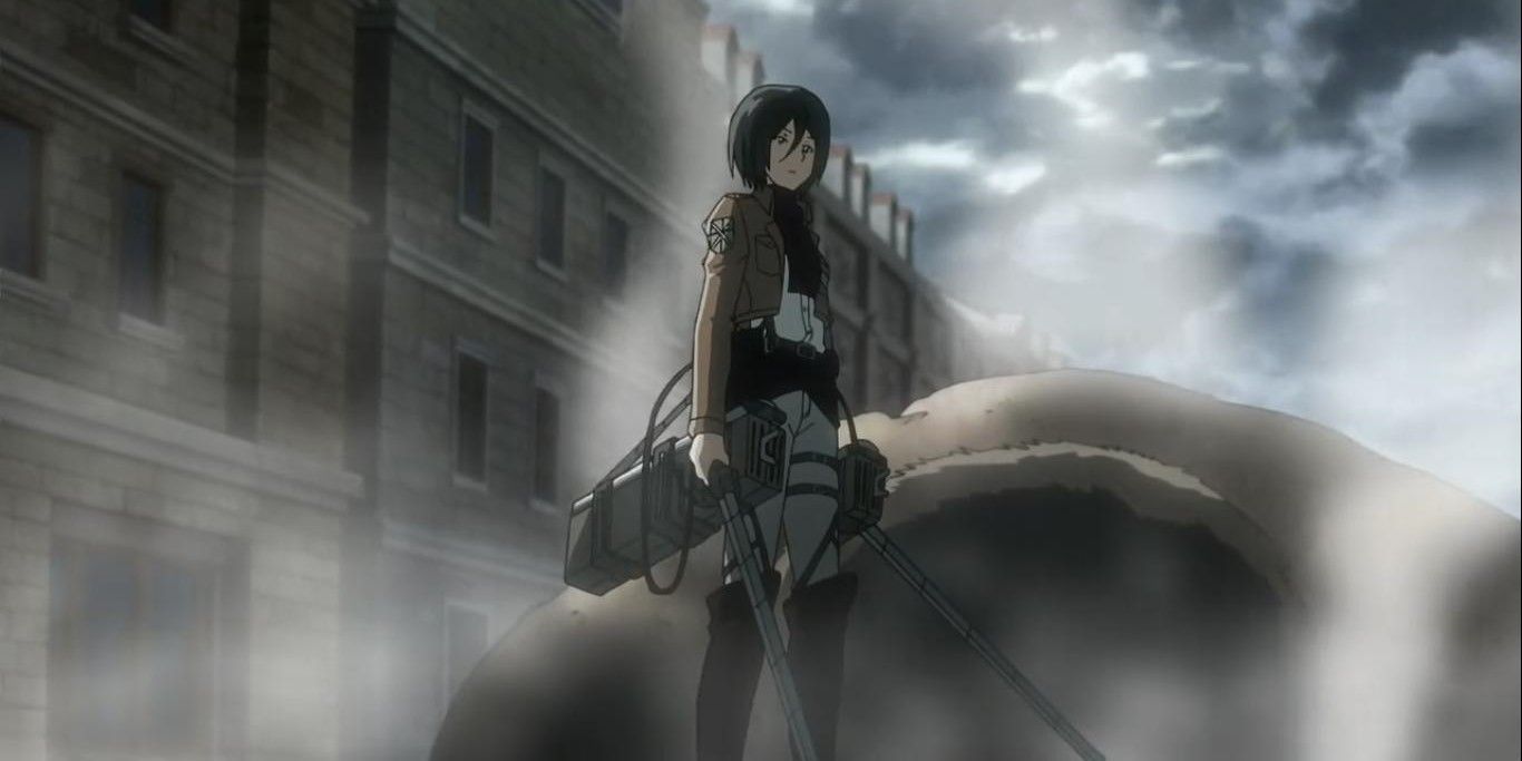 Mikasa standing on top of a titan's body which was heading towards citizens.