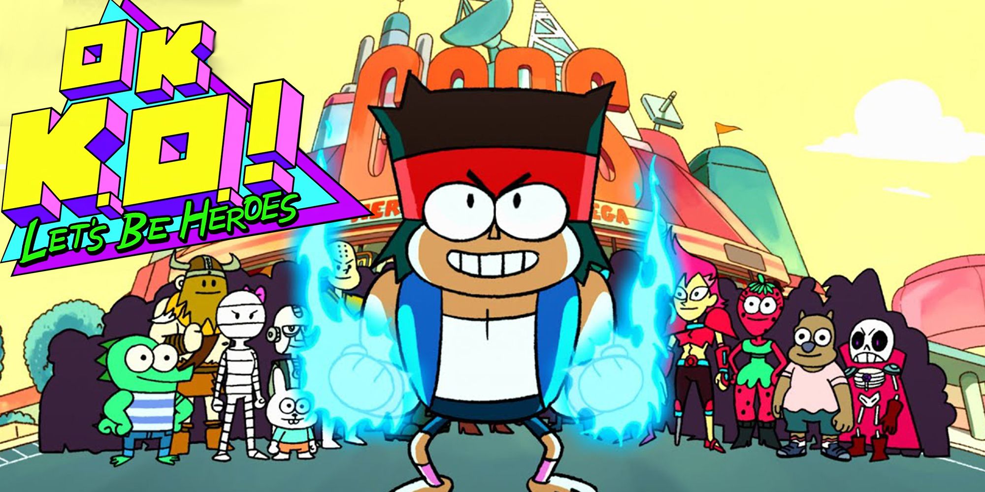 K.O. standing in front of cast