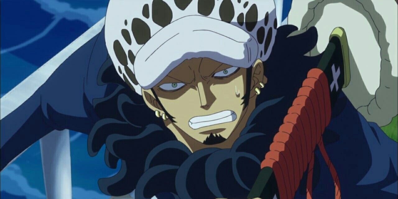 Trafalgar Law bares his teeth while fighting.