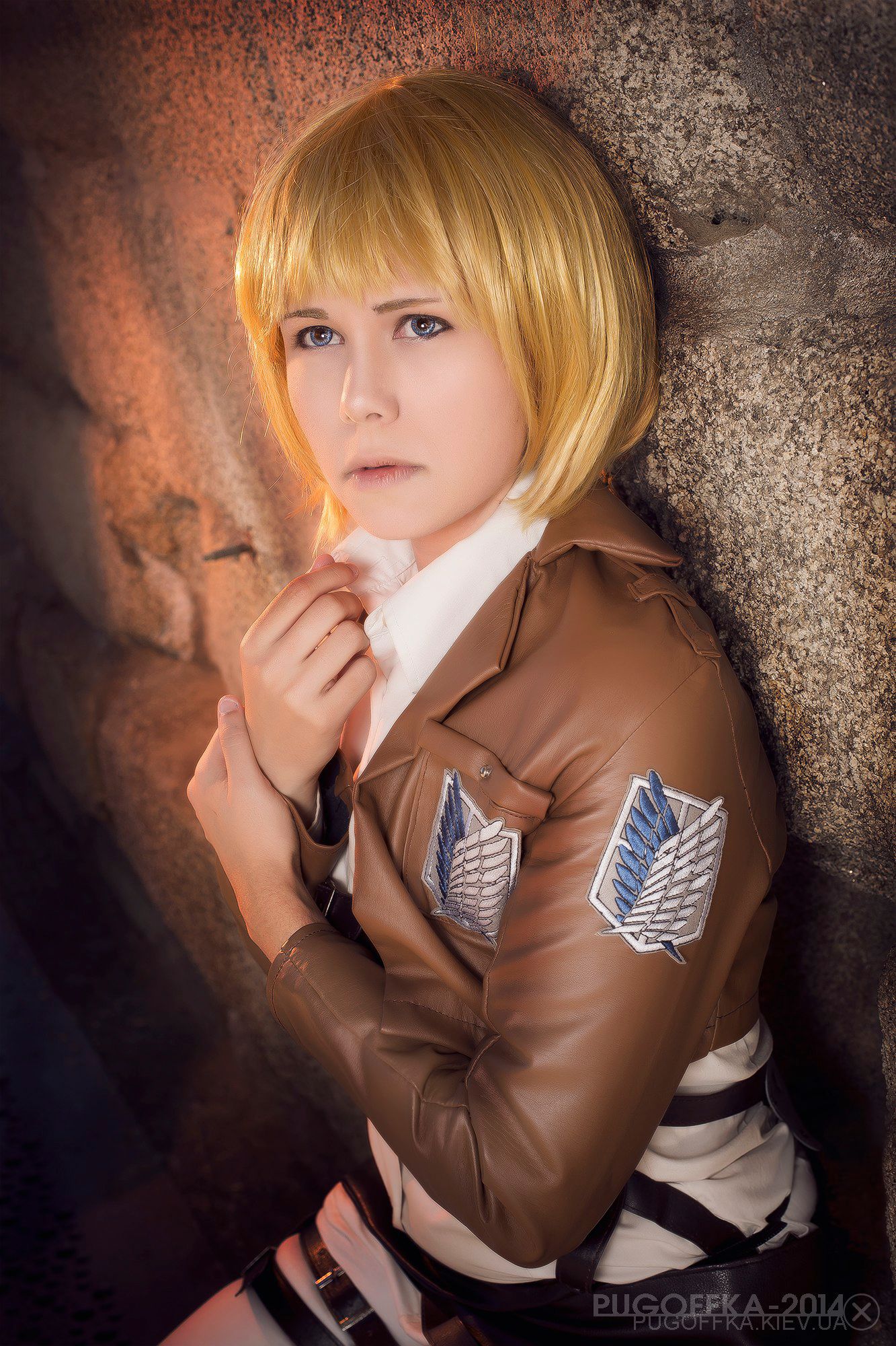 Armin cosplay wearing perfectly fitting scouts leather jacket.