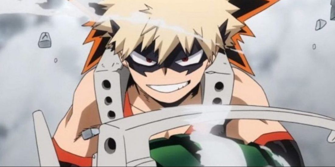 Bakugo smiling with a smirk and wearing his costume.