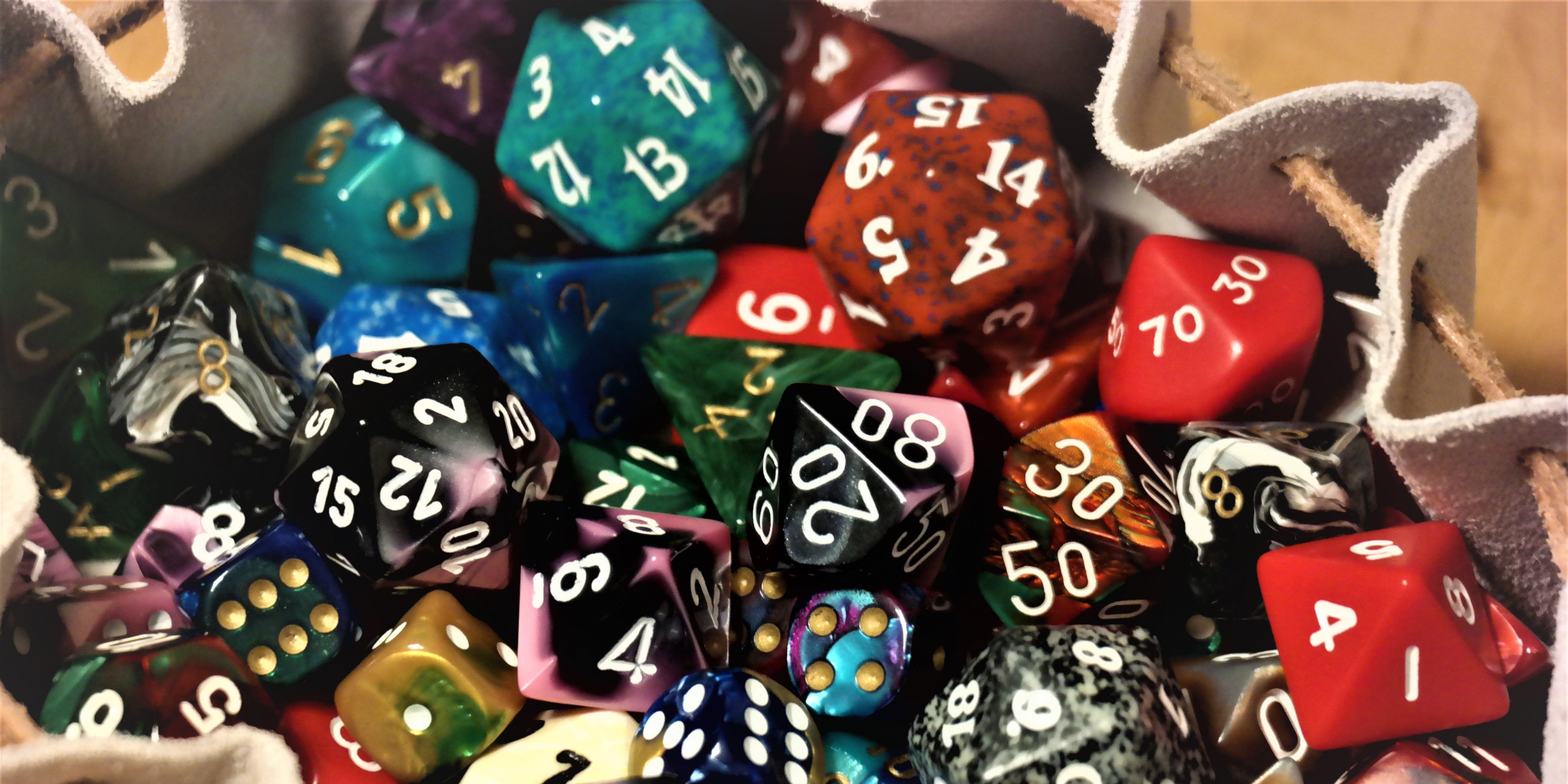 A bag of multicolored gaming dice