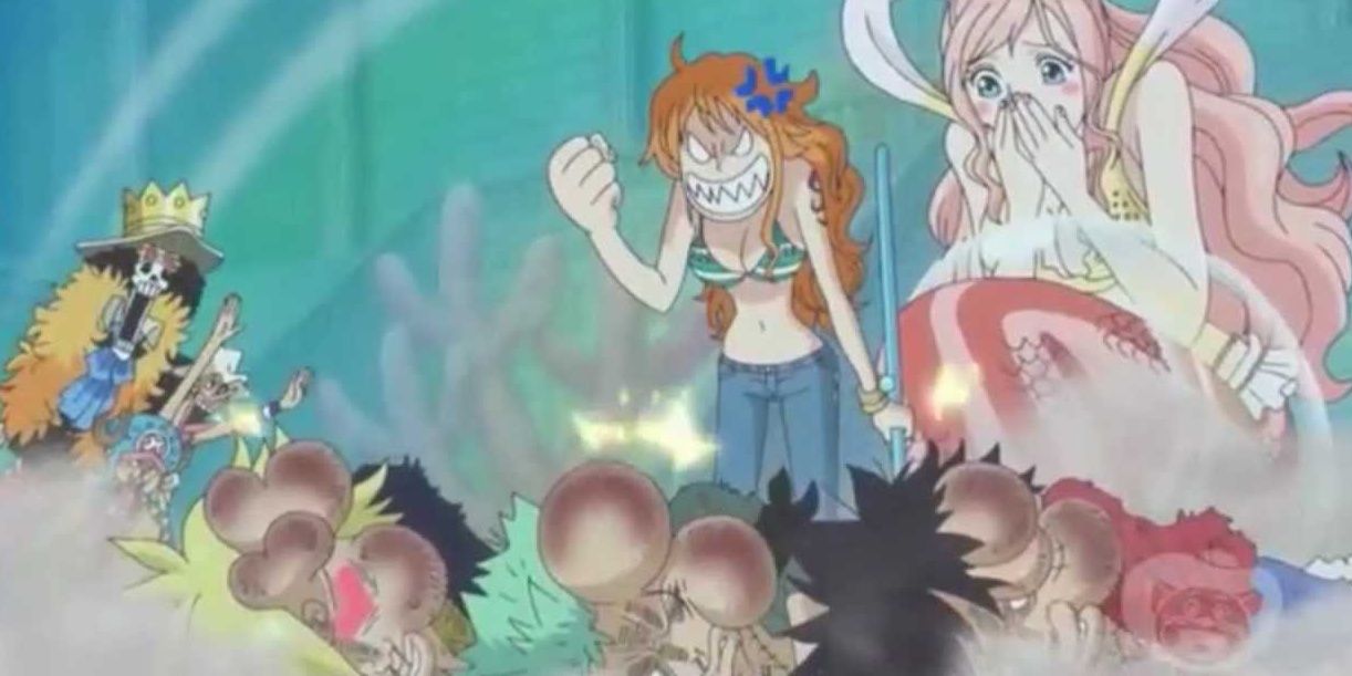 Nami punches the monster trio