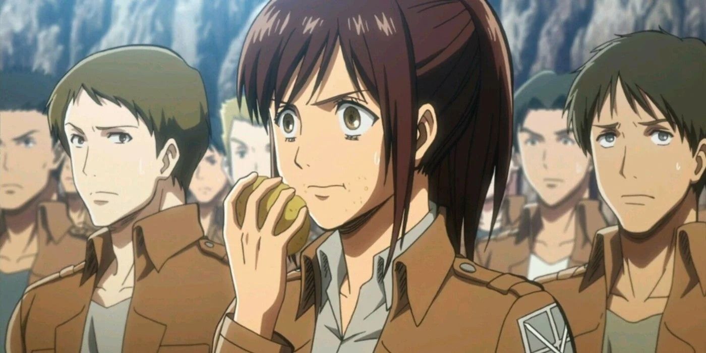 Sasha comendo uma batata no primeiro dia de treino.