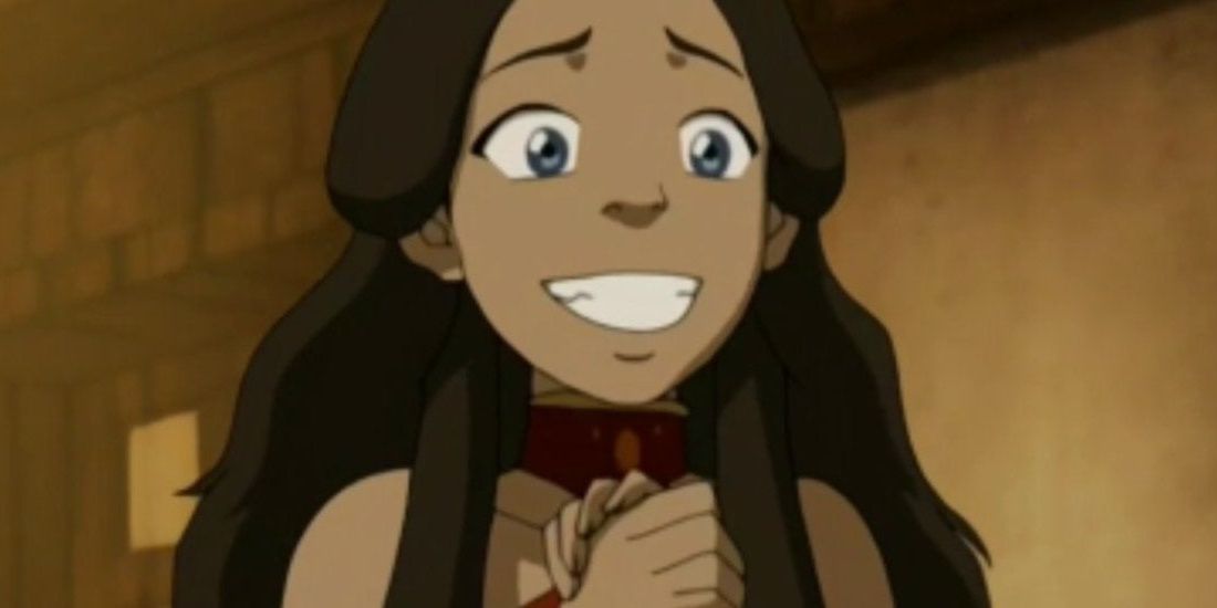 Katara smiling with hands clasped