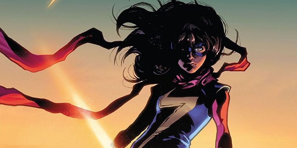 Ms. Marvel standing in front of a sunset