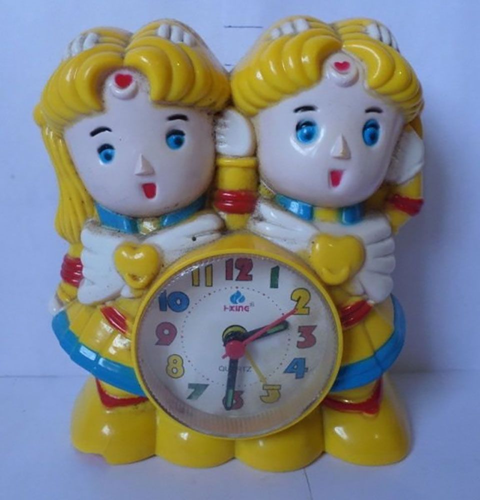 Bootleg conjoined Sailor Moons with clock