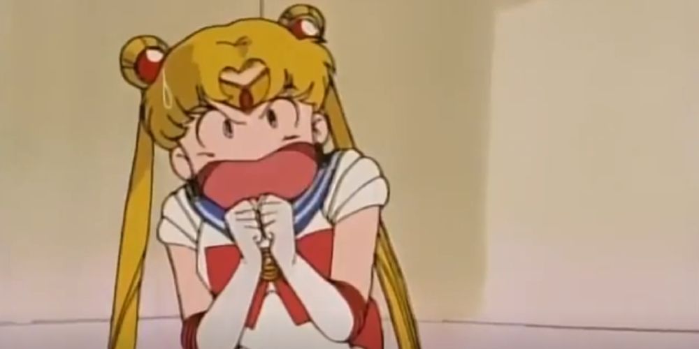 Sailor Moon trapped in a corner and screaming with a funny face