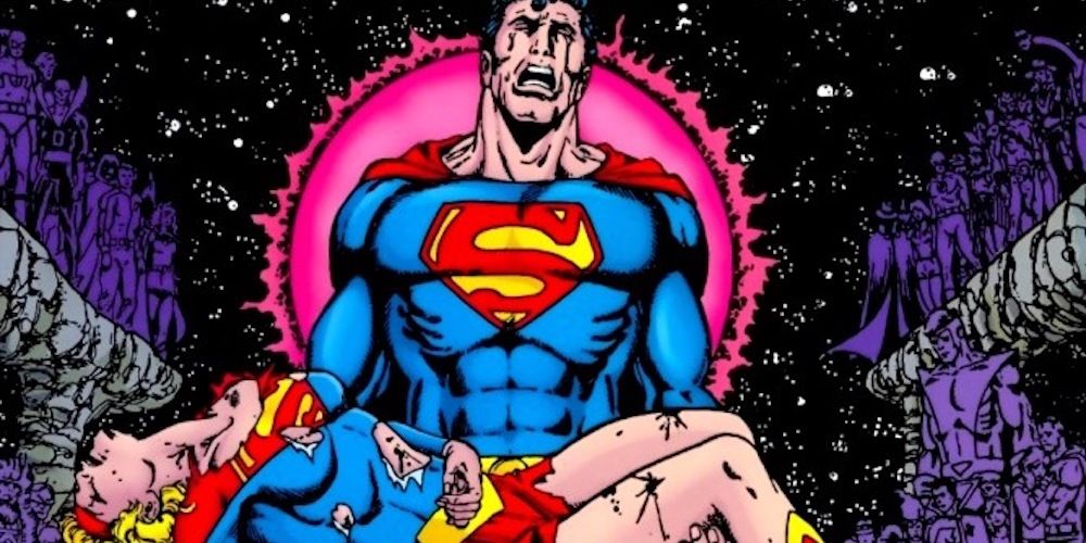 Superman cries while holding Supergirl's dead body in his arms