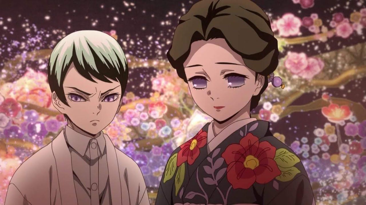 Tamaya and Yushiro stand among the flowers in Demon Slayer: Kimetsu no Yaiba