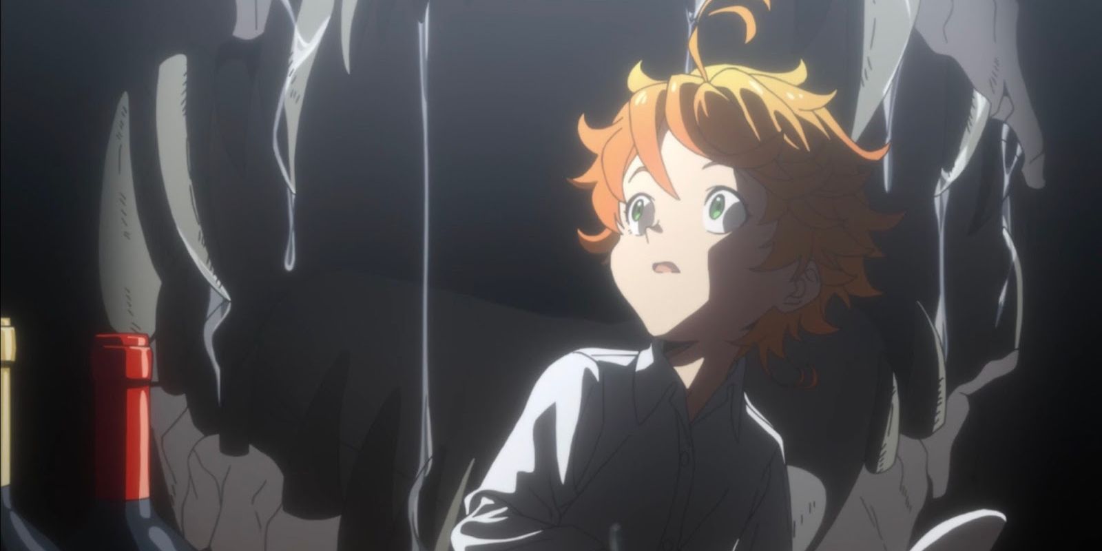 Emma scared with a demon opening its jaw behind her in The Promised Neverland.