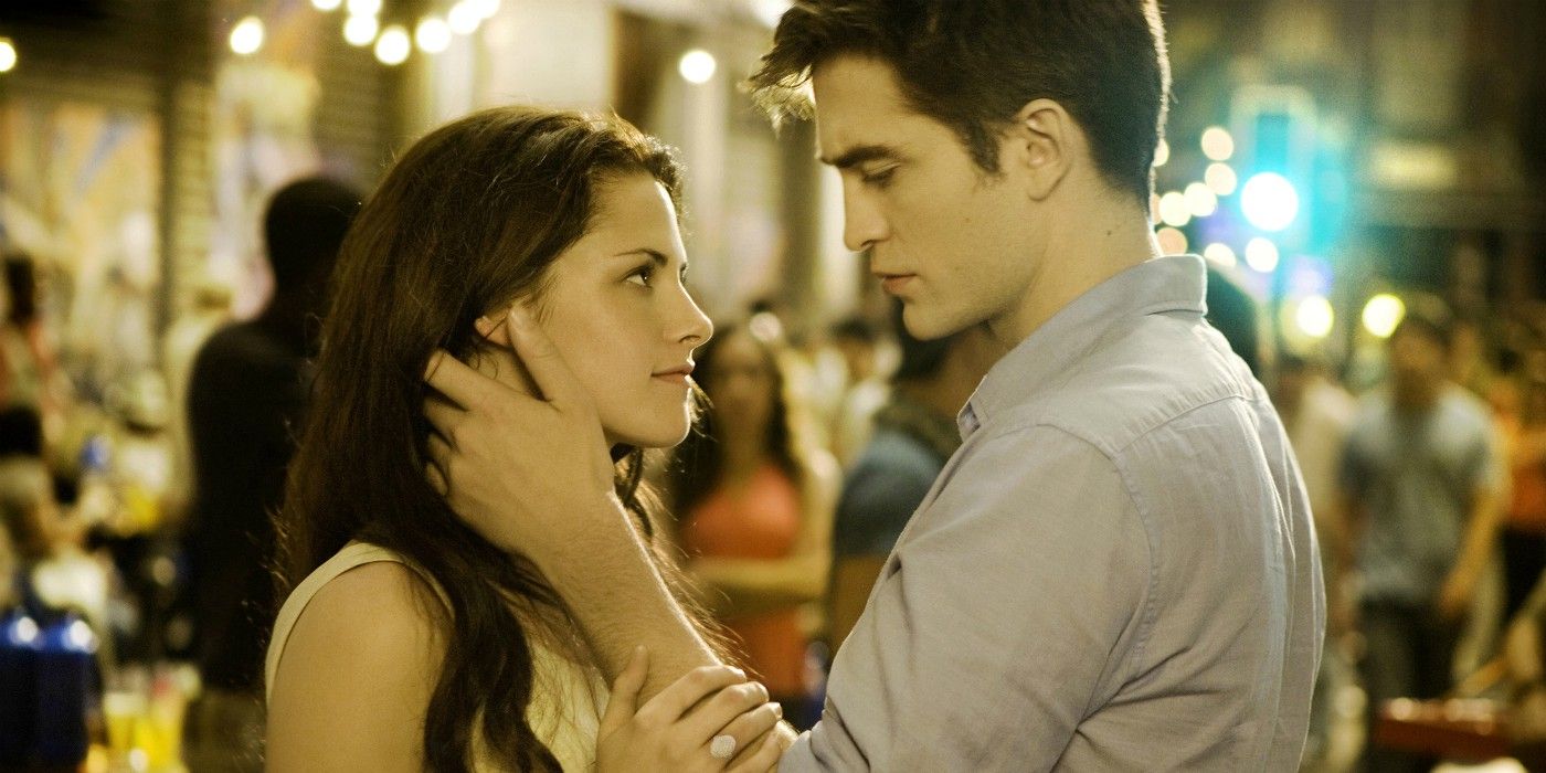 Edward looking at Bella while holding her face in Rio