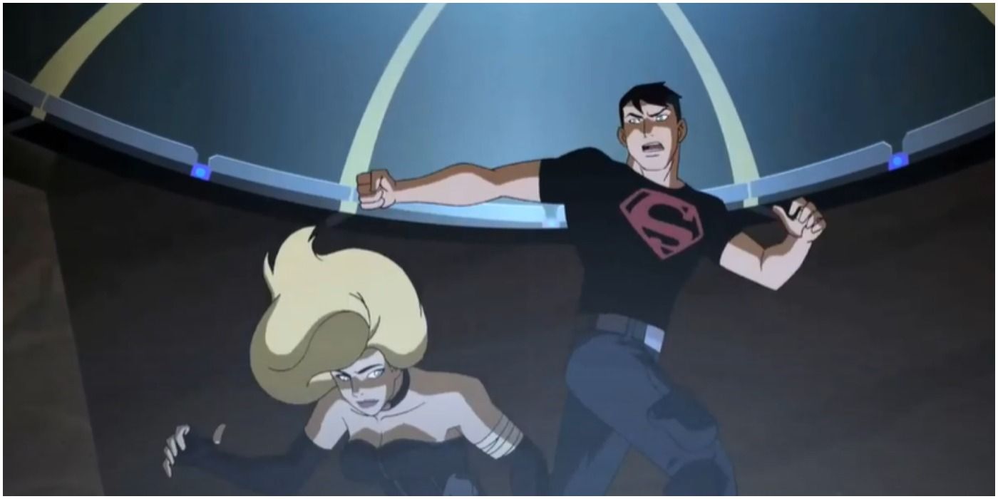 Black Canary ducking out of Superboy's strike