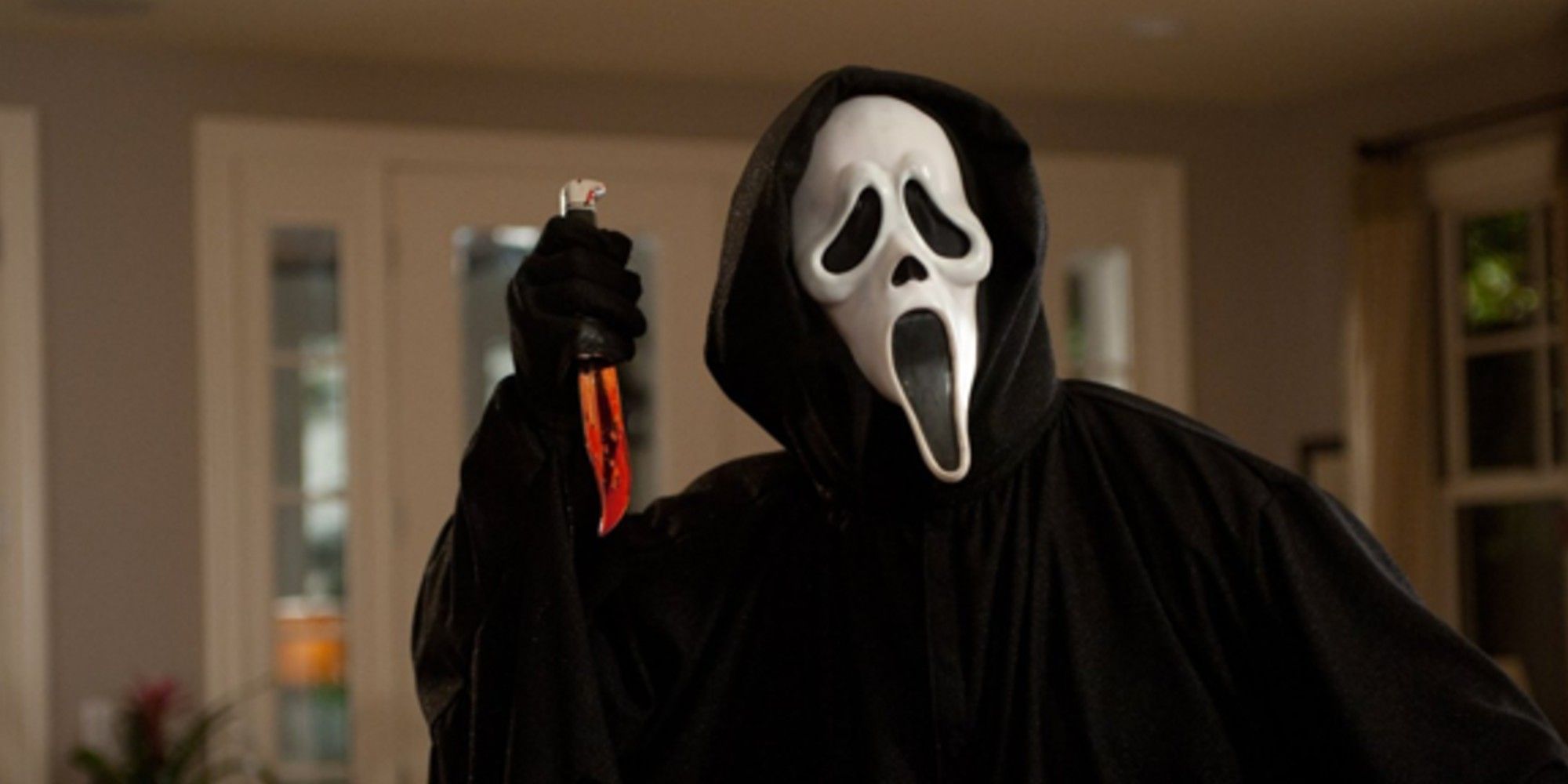 Ghostface holding a knife in Scream.