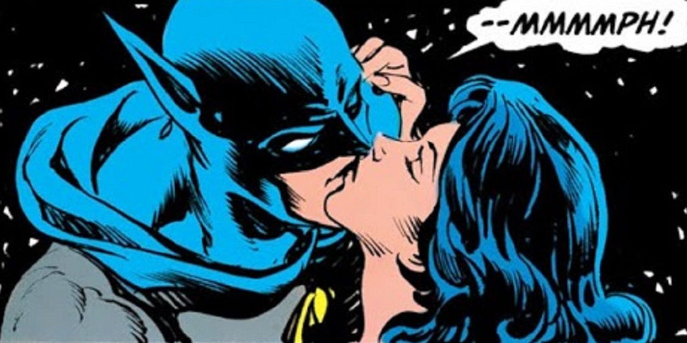 Julia Pennyworth kissing Batman while his mask is on in DC Comics