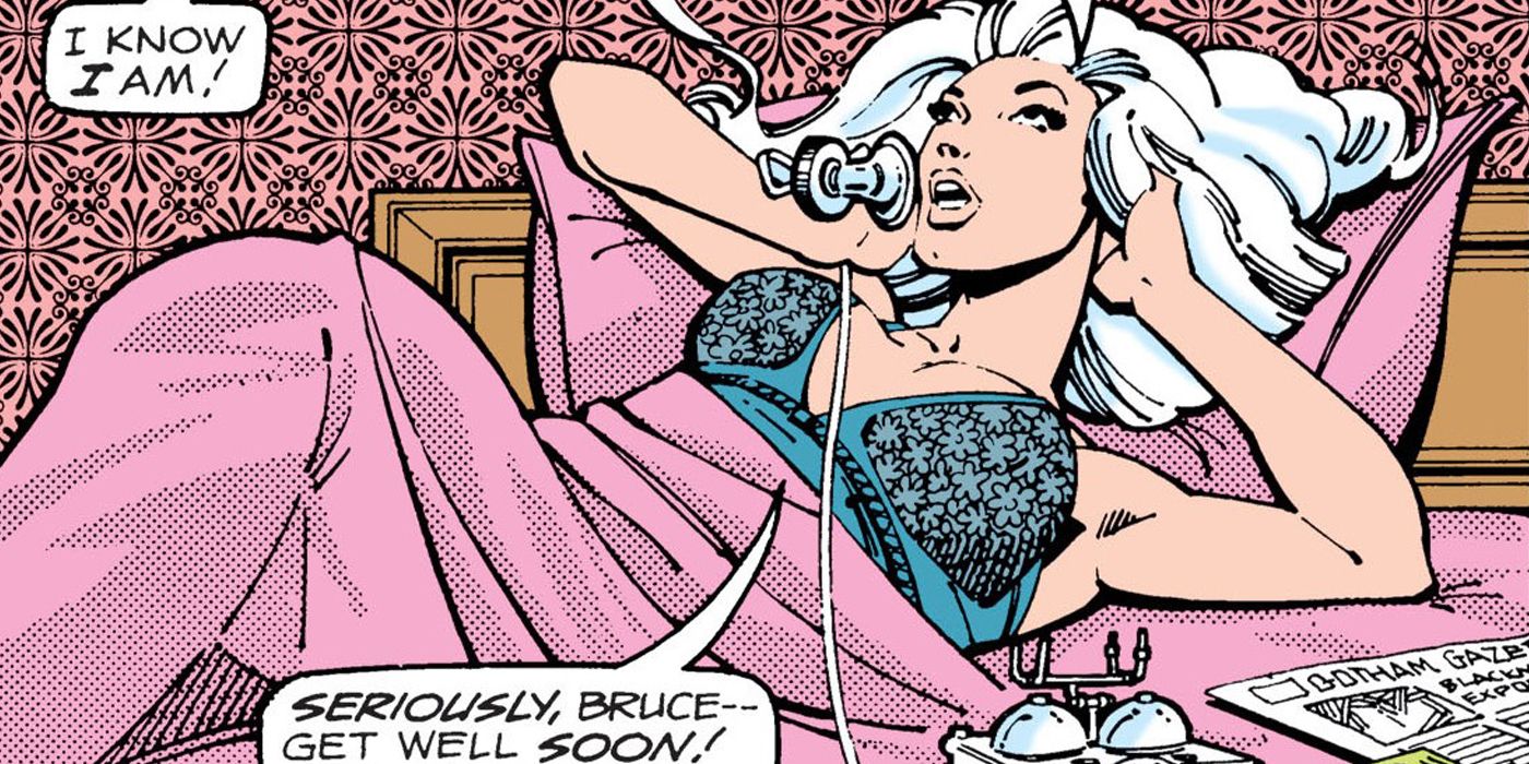 Silver St Cloud reclinging on her bed while talking with Bruce Wayne over the phone