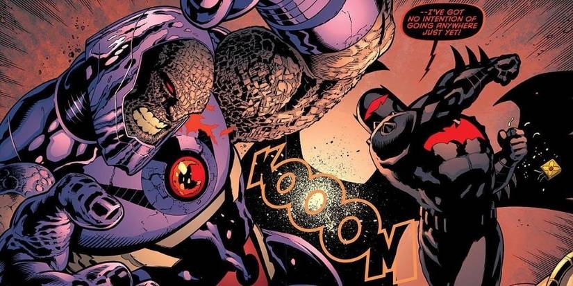 Batman punching Darkseid.